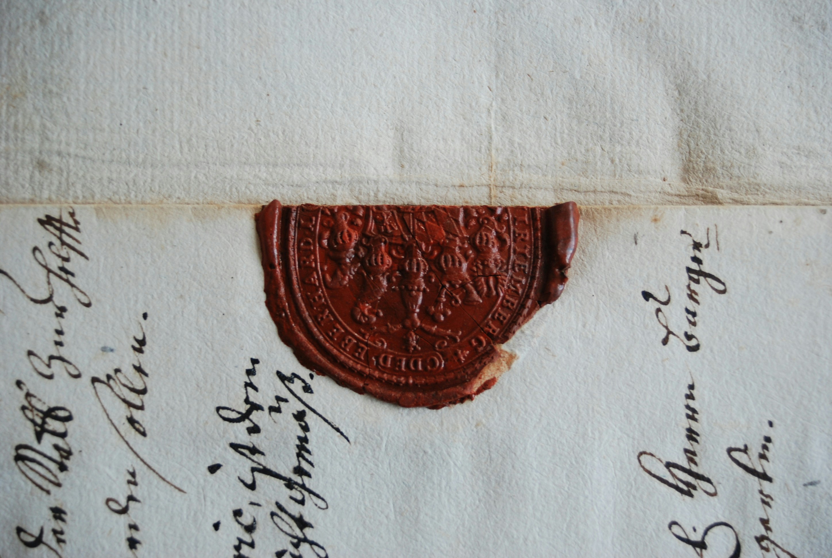 A letter with an ornate wax seal